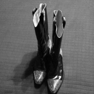 Black leather boots/ silver tone embellishments
